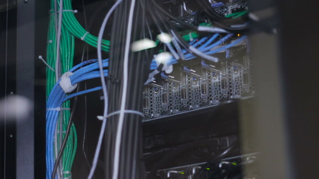 wires, lightbulbs and computer parts in render farm