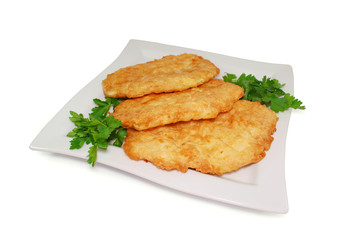 Fried Breaded Chicken Fillet in a Dish Isolated Against White Background