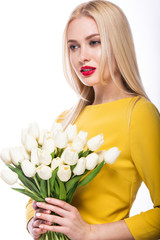 Portrait of  beautiful fashion model with bouquet  lily in hands, sweet and sensual. Beauty makeup, hair. 