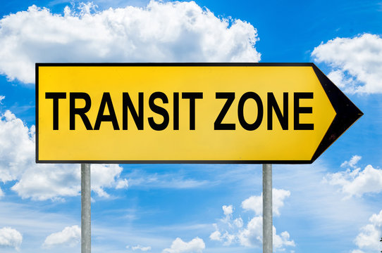 Transit zone traffic sign with cloudy blue background