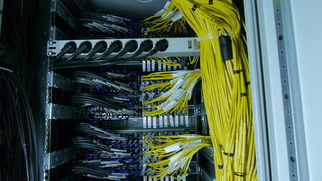 wires, lightbulbs and computer parts in render farm