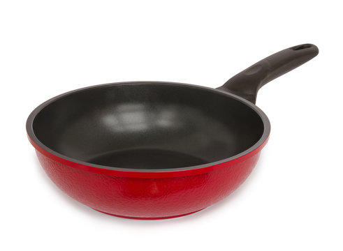 Red frying pan isolated on white background