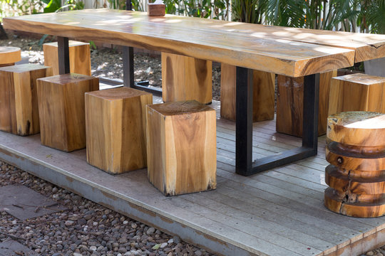 wooden table and stool in the garden