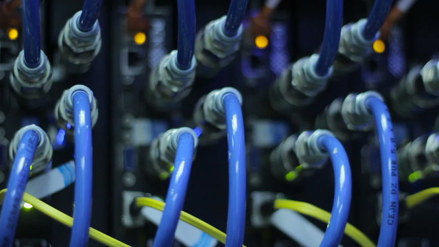 wires, lightbulbs and computer parts in render farm