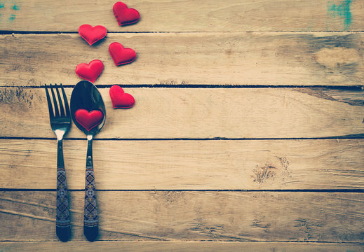 Valentines day dinner with table setting in rustic wood for Vint