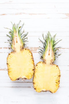 Fresh pineapple cut in half