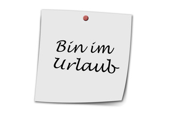 Bin im Urlaub written on a memo