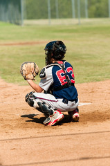 Teen american baseball catcher