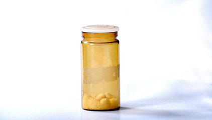 Old medicine bottle with unknown powder