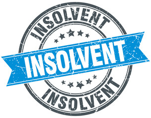 insolvent blue round grunge vintage ribbon stamp