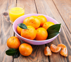 Fresh citrus juice and tangerines