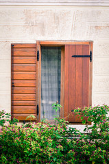 half-open wooden window