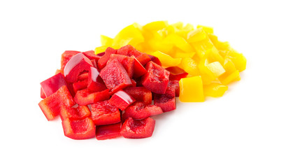 Chunks of chopped red and yellow bell peppers studio isolated