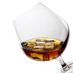 whiskey with ice in glass isolated on white 