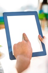 Cropped image of hipster businessman using tablet 