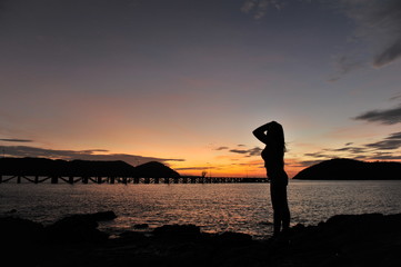 woman on beach in twilight