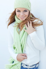 Beautiful woman with a green scarf 