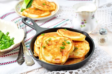 Pancakes with ham, cheese, green onions and sour cream