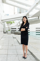 Obraz premium Businesswoman standing at outdoor