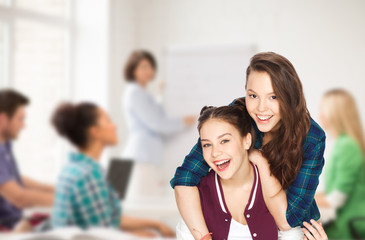 happy pretty teenage girls having fun at school