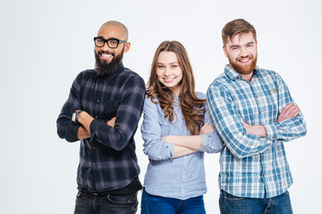Multiethnic group of three confident smiling students