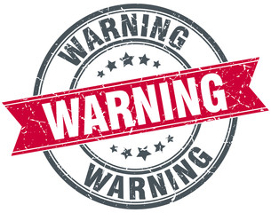 warning red round grunge vintage ribbon stamp