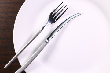 fork and knife with dish