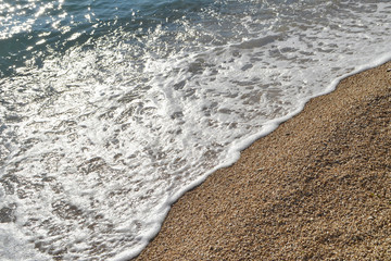 Sea water breaking the beach