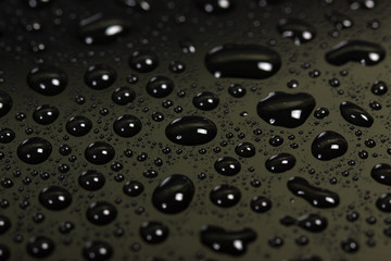 drops of water on a dark background. beautiful abstract texture. macro