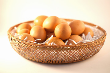 Brown eggs in basket