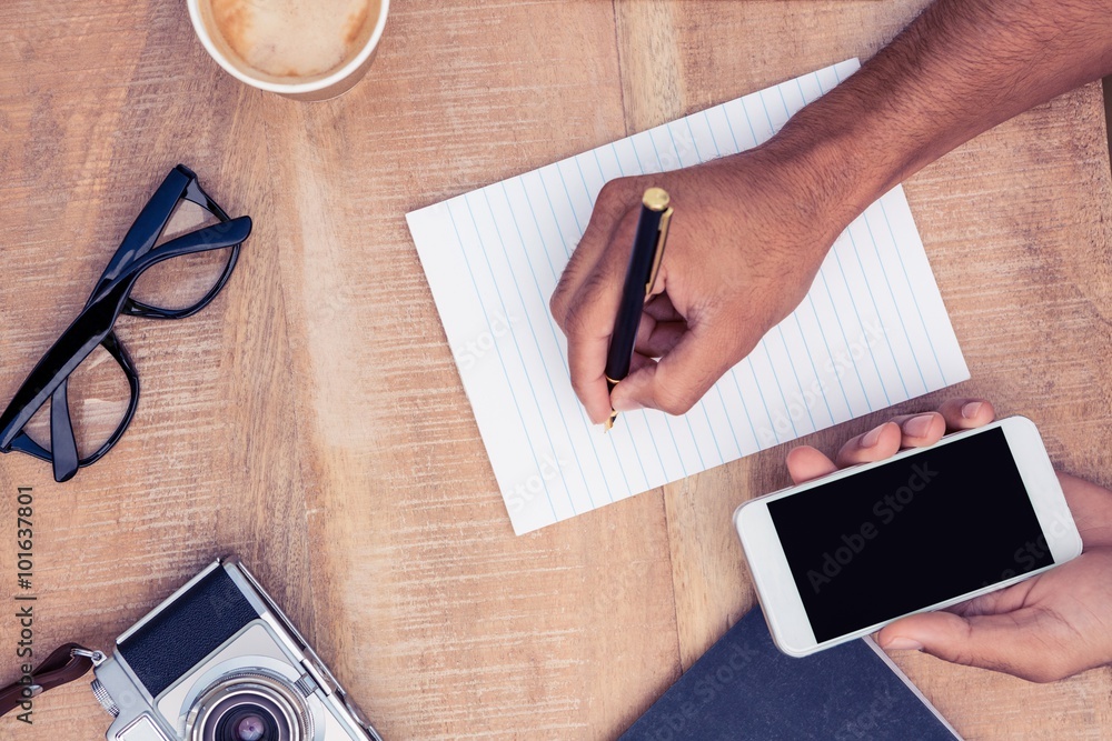Poster cropped image of businessman writing on notepad