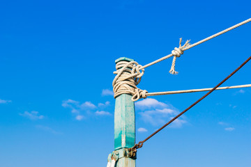 Masts of Sailboats Against a Blue Sky