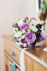 Bouquet of white  and purple roses