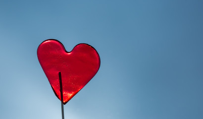 Fototapeta na wymiar heart red shaped lollipop, valentine heart, 