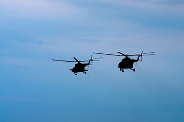two transport helicopters