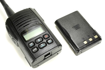 Portable walkie-talkie with back-up battery isolated on a white background