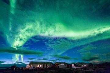 Fototapeta na wymiar Aurora borealis above a cabin