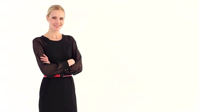 Women in Business/Woman on a white background turns his head and looks at the camera