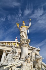 Fototapeta premium Pallas Athene Fountain, in front of the Austrian Parliament Building on Ringstrasse in Vienna 