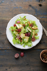 fresh salad with apple on plate