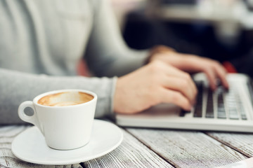 Drinking coffee, surfing internet.
