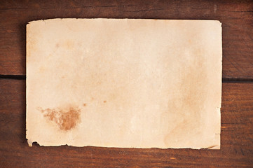 Old paper on a wooden background