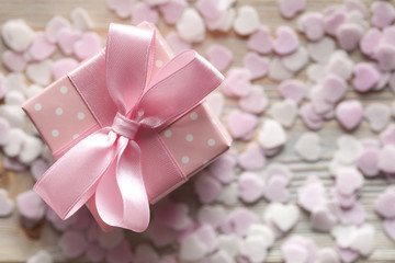 Pink gift box on abstract background