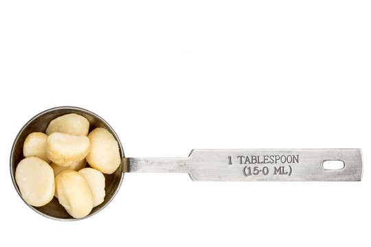 macadamia nuts in a tablespoon