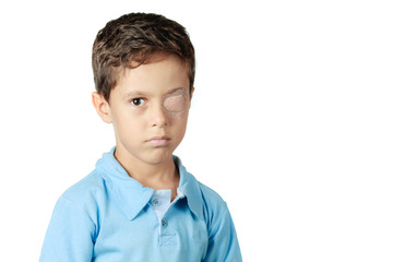 Child with eye patch isolated on white background