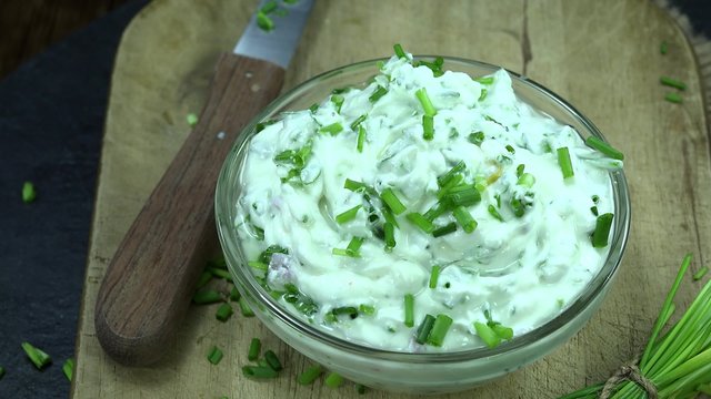 Portion of rotating Herb Curd (not loopable 4K footage)