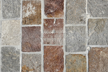 Fototapeta premium Closeup image of colored cobblestones
