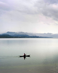 Balinese fisherman ona lake