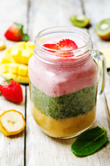 Mango Spinach strawberry kiwi banana smoothie