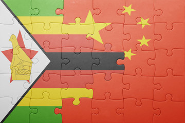puzzle with the national flag of china and zimbabwe